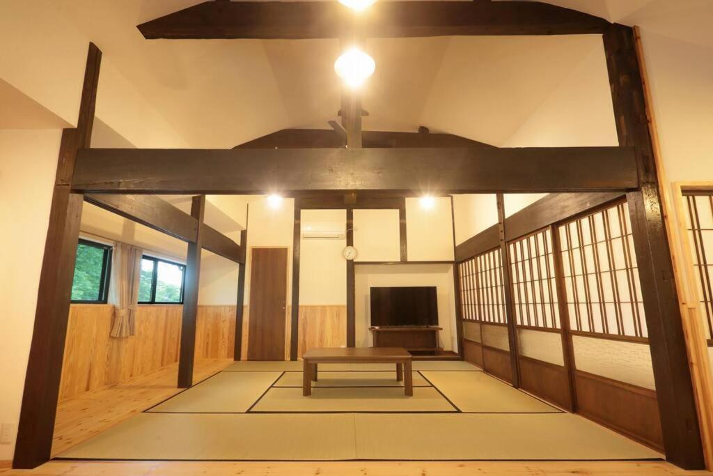 【コテージくぎの】大谷川沿いの露天風呂があるコテージ Minamiaso Exterior foto