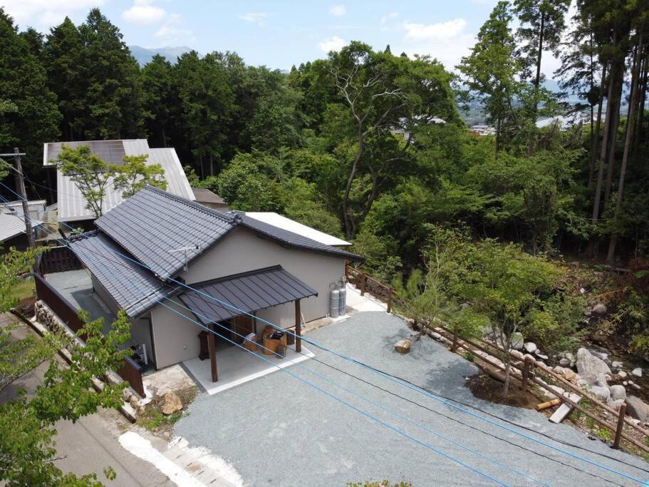 【コテージくぎの】大谷川沿いの露天風呂があるコテージ Minamiaso Exterior foto