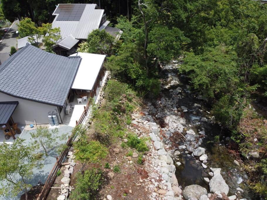 【コテージくぎの】大谷川沿いの露天風呂があるコテージ Minamiaso Exterior foto
